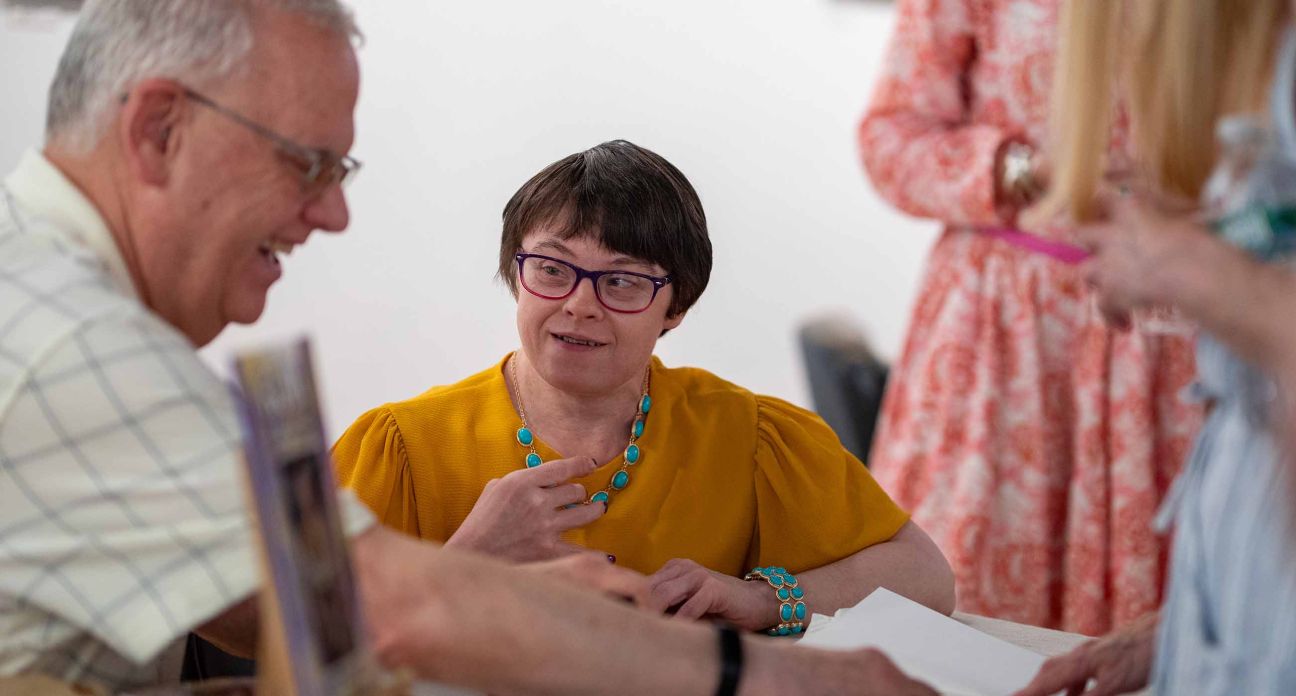 A women and a men talking